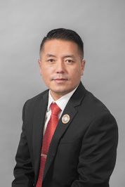 Headshot of Moua Xiong the Secretary of WHA.